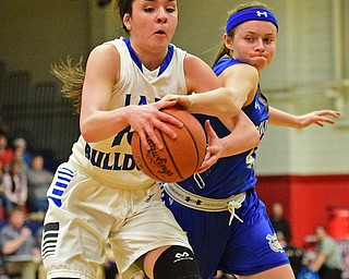 AUSTINTOWN, OHIO - FEBRUARY 22, 2016: Annie Pavlansky #10 of Lakeview secures a rebound while Emily Melnek #42 of Poland attempts to rip the ball free during the 1st half of their game Monday night at Austintown Fitch High School. DAVID DERMER | THE VINDICATOR