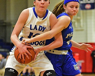 AUSTINTOWN, OHIO - FEBRUARY 22, 2016: Annie Pavlansky #10 of Lakeview secures a rebound while Emily Melnek #42 of Poland attempts to rip the ball free during the 1st half of their game Monday night at Austintown Fitch High School. DAVID DERMER | THE VINDICATOR
