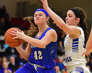 AUSTINTOWN, OHIO - FEBRUARY 22, 2016: Emily Melnek #42 of Poland goes to the basket while being pressured by Annie Pavlansky #10 of Lakeview during the 1st half of their game Monday night at Austintown Fitch High School. DAVID DERMER | THE VINDICATOR