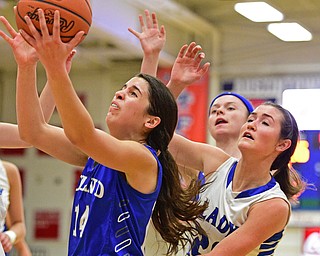 AUSTINTOWN, OHIO - FEBRUARY 22, 2016: Jillian Penman #14 of Poland grabs a rebound away from Lindsay Carnaham #20 of Lakeview during the 1st half of their game Monday night at Austintown Fitch High School. DAVID DERMER | THE VINDICATOR