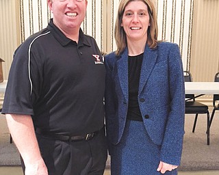 SPECIAL TO THE VINDICATOR | Youngstown Lions Club welcomed Youngstown State University baseball head coach Steve Gillispie as a guest speaker for its Feb. 11 luncheon meeting. Gillispie reported that the YSU baseball team had increased its winning percentage consistently throughout the past three seasons and that the team has also made a large jump in scheduling more difficult opponents to challenge their players. Nine of the 32 rostered players are from the Mahoning Valley or western Pennsylvania. Myra Vitto, the third vice president for the Lions, is pictured with Gillispie.