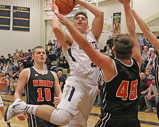 Brookfield's Marc Kraml (2) puts up a jump shot while being defended by Zane Rummell (45) of Mineral Ridge during the first quarter of Tuesday nights matcup at Brookfield High School.  Dustin Livesay   |   The Vindicator  2/24/16  Brookfield High School.