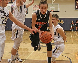 Riko Rodriguez (2) of Mineral Ridge puts up an off balance layup while being surrounded by Brookfield defenders lead by Moataz Rasoul (23), Marc Kraml (2) and Chad Filipovich (1) during the second quarter of Tuesday nights matcup at Brookfield High School. Dustin Livesay | The Vindicator 2/24/16 Brookfield High School.