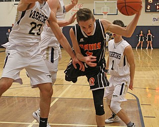 Riko Rodriguez (2) of Mineral Ridge puts up an off balance layup while being surrounded by Brookfield defenders lead by Moataz Rasoul (23) during the second quarter of Tuesday nights matcup at Brookfield High School.  Dustin Livesay   |   The Vindicator  2/24/16  Brookfield High School.