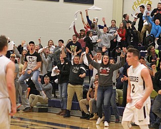 The Brookfield High School student section erupts in cheers after a nearly full court shot was made by Mark Kraml (2) in the closing seconds of the third quarter during Tuesday nights matcup against Mineral Ridge.  Dustin Livesay   |   The Vindicator  2/24/16  Brookfield High School.