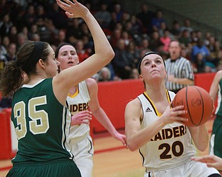 William D Lewis the Vindicator  SR's Morgan Czopur(20) shoots past Ursuline's Lindsay Bell(35).