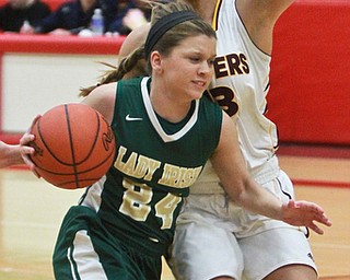William d Lewis The Vindicator  Ursuline's Gabby Miklandric(24) drives around SR's Maddie Durkin (13)