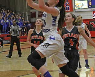 Lakeview's Annie Pavlansky (10) goes in for a layup after driving past Howland's Mackenzie Maze (4) during the fourth quarter of Thursday nights matchup at Austintown Fitch High School.   Dustin Livesay  |  The Vindicator  2/25/16  Austintown.
