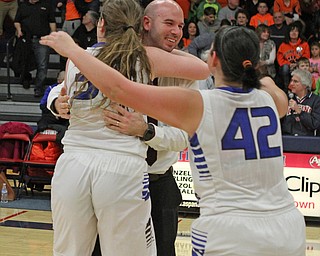 Lakeview head coach Adam Lewis celebrates with Kylee Mann (42) and Addie Becker (34) after the Bulldogs defeated Howland High School to win the Dictrict Championship at Austintown Fitch High School on Thursday night.   Dustin Livesay  |  The Vindicator  2/25/16  Austintown.