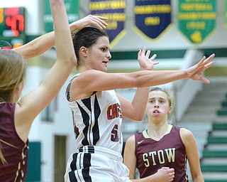 Jeff Lange | The Vindicator  THU, FEB 25, 2016 - Canfield's Serena Sammarone (center) makes a pass through a host of Stow defenders in the fourth quarter of their Division I district championship game in Akron Thursday night. Stow defeated Canfield 56-40.