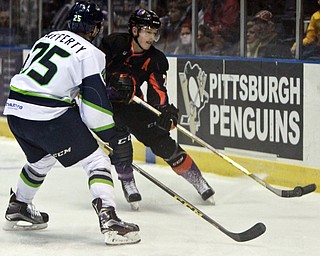 William D Lewis the Vindicator Pahntoms ChasePearson(22) shoots past Thunder's Brogan Rafferty(25).