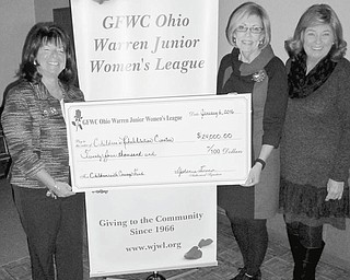 SPECIAL TO THE VINDICATOR | GFWC Ohio Warren Junior Women’s League recently hosted its 46th annual champagne luncheon and fashion show at W.D. Packard Music Hall in Warren and proceeds benefitted the Children with Courage fund at the Children’s Rehabilitation Center in Howland. League member and event chairman Renee Maiorca, left, presented a donation of $24,000 to the center’s board president, Carolyn Richardson, with help from WJWL president Mary Lou Jarrett.