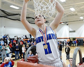Jeff Lange | The Vindicator  SAT, FEB 27, 2016 - Jackson-Milton's Ashley Totani snips a portion of the net after defeating McDonald Saturday at Mineral Ridge High School.