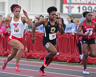 YOUNGSTOWN, OHIO - FEBRUARY 28, 2016: Nina Grambling of YSU sprints to the finish line with Kendell Jefferson of Oakland and Allison Garner of Detroit during the women's 60 meter dash final Sunday afternoon during the Horizon League Championship meet at the Watts Training Facility. DAVID DERMER | THE VINDICATOR