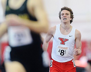 Jeff Lange | The Vindicator  SUN, FEB 28, 2016 - YSU's James Nedrich sprints to the finish in the one mile run event at Sunday's Horizon League Indoor Track Championship in Youngstown.
