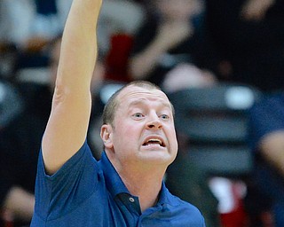 Jeff Lange | The Vindicator  MON, FEB 29, 2016 - McDonald head coach Jeff Rasile calls out a play from the sideline of Monday's district semifinal game against Lowellville in Struthers.