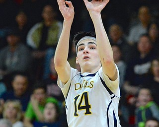 Jeff Lange | The Vindicator  MON, FEB 29, 2016 - McDonald's Lucas Garland looks to the basket as he attempts a three-point shot in the first half of the Devils' matchup against Lowellville in the district semifinal at Struthers High School on Monday.