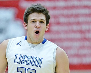 Jeff Lange | The Vindicator  TUE, MAR 1, 2016 - Lisbon's Avery Andric celebrates after a three in the first half of Lisbon's DIV district semifinal against Wellsville Tuesday night at the Struthers Fieldhouse.