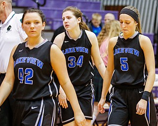 Lakeview's Kylee Mann (42) Addie Becker (34) and Jensen Silbaugh (5) appear dejected after their Division II girls regional semifinal game against Elyria Catholic at Barberton High School, Tuesday, March 1, 2016, in Barberton, Ohio. Elyria Catholic beat Lakeview 50-44. Alex Slitz for The Vindicator