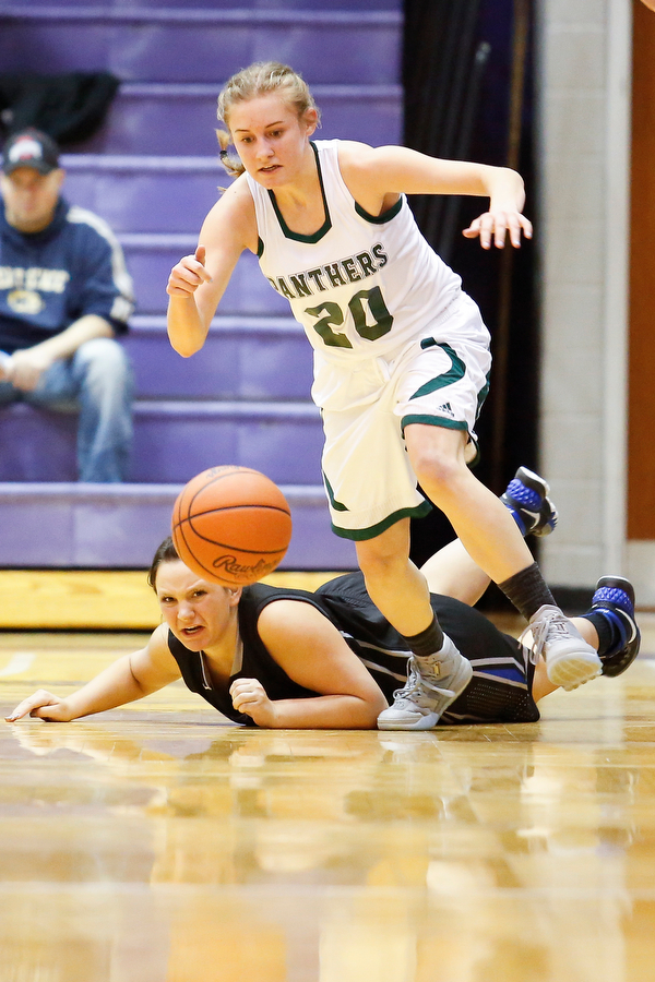 Elyria Catholic's Sam Filiaggi (20) recovers a loose ball past Lakeview's Kylee Mann (42) during their  Division II girls regional semifinal game at Barberton High School, Tuesday, March 1, 2016, in Barberton, Ohio. Elyria Catholic beat Lakeview 50-44. Alex Slitz for The Vindicator