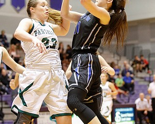Lakeview's Annie Pavlansky (10) goes to the hoop against Elyria Catholic's Nora Hopkins (22) during their  Division II girls regional semifinal game at Barberton High School, Tuesday, March 1, 2016, in Barberton, Ohio. Elyria Catholic beat Lakeview 50-44. Alex Slitz for The Vindicator