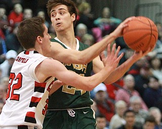 William d lewis the vindicator  Ursuline Greg Pzrella(24) keeps the ball from Canfield's Julian Vitto(32).