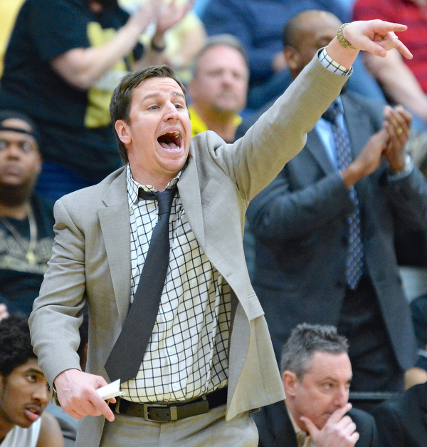 Jeff Lange | The Vindicator  WED, MAR 2, 2016 - Harding Raiders head coach Andy Vlajkovich calls out a play late in Wednesday's DI district semifinal against Louisville at Alliance High School.
