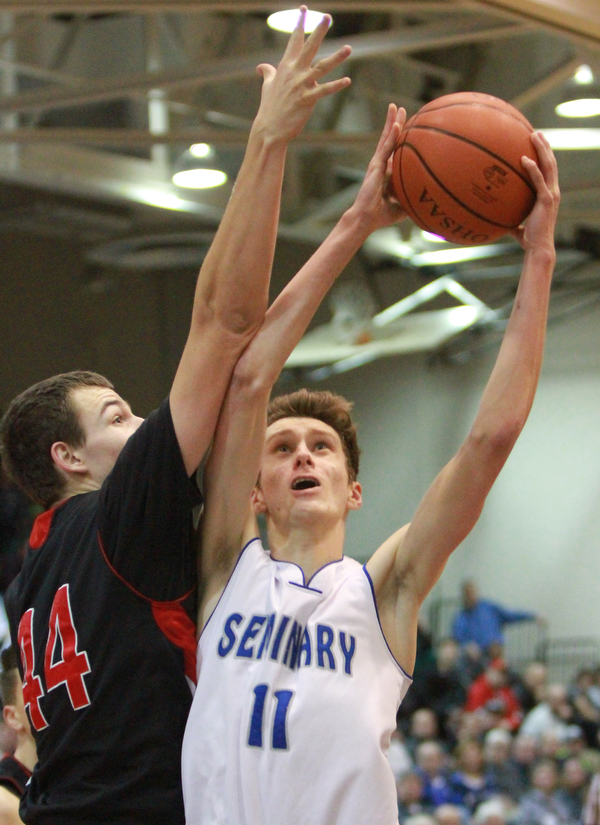 william d Lewis the vindicator  Poland's MAtt Baker(11) shoots past Salem's JoeRusyn(44)