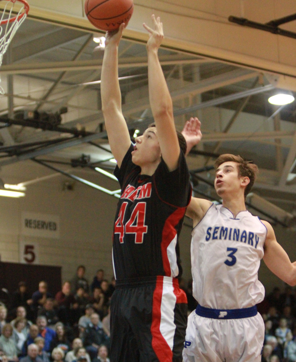 William D Lewis The vindicator  Salem's Nick rusyn(44) shoots past Poland's Mike Gajdos(3)