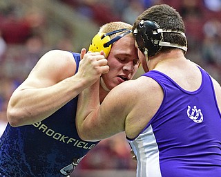 COLUMBUS, OHIO - MARCH 3, 2016: Zach Hackett of Brookfield attempts to break free from the grasp of Hunter Bodkin of Martins Ferry during their 220lb Division III championship bracket bout Thursday night at Schottenstein Center. DAVID DERMER | THE VINDICATOR