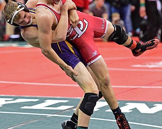 COLUMBUS, OHIO - MARCH 3, 2016: Jason Keyes of Beaver Local is taken down by Mac Altom of Eaton during their 145lb Division II championship bracket bout Thursday night at Schottenstein Center. DAVID DERMER | THE VINDICATOR