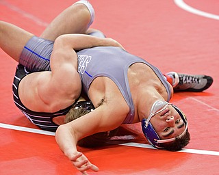 COLUMBUS, OHIO - MARCH 3, 2016: Anthony Audi of Poland looks up while Aidan Pasiuk of Carrollton scores back points after a near fall during their 170lb Division II championship bracket bout Thursday night at Schottenstein Center. DAVID DERMER | THE VINDICATOR..