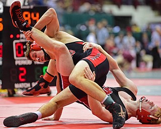 COLUMBUS, OHIO - MARCH 3, 2016: David Crawford of Canfield spins out to put pressure onto Gunnar Dawson of Middletown during their 160lb Division II championship bracket bout Thursday night at Schottenstein Center. DAVID DERMER | THE VINDICATOR.