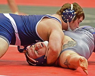 COLUMBUS, OHIO - MARCH 3, 2016: Trey Ellis of Poland attempts to prevent from being pined by Jared Croswell of Bishop Hartley during their 220lb Division II championship bracket bout Thursday night at Schottenstein Center. DAVID DERMER | THE VINDICATOR.