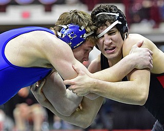 COLUMBUS, OHIO - MARCH 3, 2016: Dominic Cooper of Canfield bumps heads with Robbie Bowers of Defiance during their 182lb Division II championship bracket bout Thursday night at Schottenstein Center. DAVID DERMER | THE VINDICATOR.