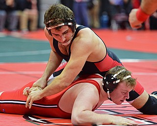 COLUMBUS, OHIO - MARCH 3, 2016: Jacob Esarco of Canfield control the back of Logan Ford of down to the mat during their 220lb Division II championship bracket bout Thursday night at Schottenstein Center. DAVID DERMER | THE VINDICATOR..