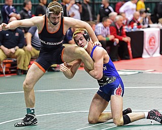 COLUMBUS, OHIO - MARCH 3, 2016: Adam Green of Fitch controls the leg of Max Wright of Delaware Hayes during their 160lb Division I championship bracket bout Thursday night at Schottenstein Center. DAVID DERMER | THE VINDICATOR