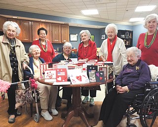 SPECIAL TO THE VINDICATOR | Residents from the Commons Assisted Living at Greenbriar Healthcare Center, Boardman, and the Paisley House, Youngstown, recently worked together to create Valentine’s Day cards for local veterans. The event was part of the Giving Project which was started by the Paisley House to promote community service. A liaison for the local Veterans Association accepted the cards, which will be distributed to veterans in the Youngstown area.