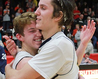 William d Lewis the Vindicator  McDonald's Zack fedyski, left, and Jake Reckard react after McDonald defeated wellsvile 3-4-16 at Struthers.