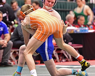 COLUMBUS, OHIO - MARCH 4, 2016: Dante Gannett of Poland stuffs a takedown attempt from Tyler Warner of Claymont during their 120lb  Division II championship bracket bout Friday afternoon at Schottenstein Center. DAVID DERMER | THE VINDICATOR