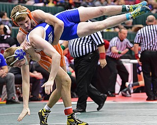 COLUMBUS, OHIO - MARCH 4, 2016: Dante Gannett of Poland braces himself while being slammed to the mat by Tyler Warner of Claymont during their 120lb  Division II championship bracket bout Friday afternoon at Schottenstein Center. DAVID DERMER | THE VINDICATOR