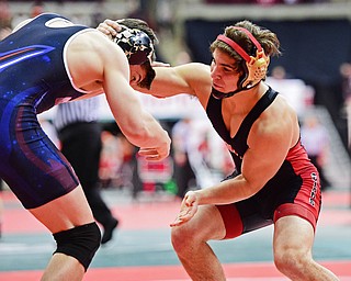 COLUMBUS, OHIO - MARCH 4, 2016: Georgio Pollas of Canfield prepares to take a shot to the legs of Vince Zitello of Bay Village during their 152lb Division II championship bracket bout Friday afternoon at Schottenstein Center. DAVID DERMER | THE VINDICATOR