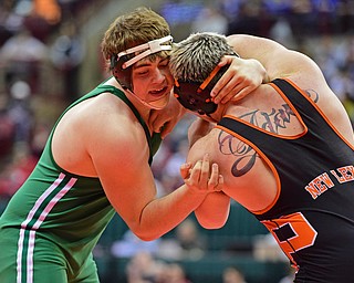 COLUMBUS, OHIO - MARCH 4, 2016: Ian Sharp of West Branch grapples with Matt Adams of New Lexington during their 285lb Division II championship bracket bout Friday afternoon at Schottenstein Center. DAVID DERMER | THE VINDICATOR