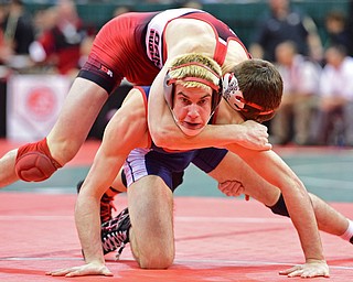 COLUMBUS, OHIO - MARCH 4, 2016: Adam Green of Fitch looks to his cover for advice while Dylan Roth of Cincinnati Oak Hills controls his back during their 160lb Division I championship bracket bout Friday afternoon at Schottenstein Center. DAVID DERMER | THE VINDICATOR