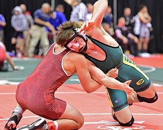 COLUMBUS, OHIO - MARCH 4, 2016: Michael Carpenter of St. Edwards reaches to take control of the back of Mario Graziani of Boardman during their 160lb Division I championship bracket bout Friday afternoon at Schottenstein Center. DAVID DERMER | THE VINDICATOR