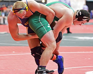 COLUMBUS, OHIO - MARCH 4, 2016: Zach Hackett of Brookfield and Collin Kelly of Mogadore wrestle for control standing up during their 220lb Division III consolation bracket bout Friday afternoon at Schottenstein Center. DAVID DERMER | THE VINDICATOR