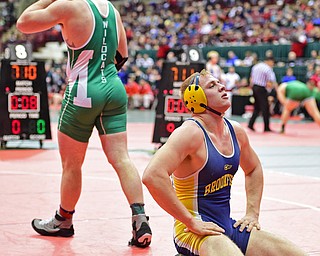 COLUMBUS, OHIO - MARCH 4, 2016: Zach Hackett of Brookfield takes a deep breath on the mat after being defeated by Collin Kelly of Mogadore during their 220lb Division III consolation bracket bout Friday afternoon at Schottenstein Center. DAVID DERMER | THE VINDICATOR