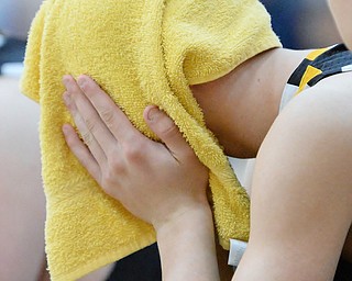 Jeff Lange | The Vindicator  FRI, MAR 4, 2016 - A Garrettsville Garfield player hides his face under his towel after a 34-31 loss to Newton Falls in the DIII district championship game at Warren Harding High School Friday night.
