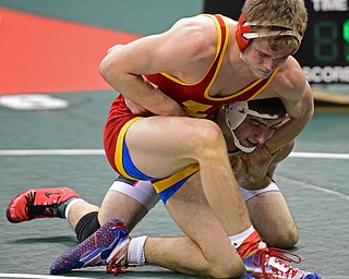 COLUMBUS, OHIO - MARCH 5, 2016: C.J. Frost of Canfield works to take Miles Mazik of Indian Valley to the mat during their 138lb  Division II consolation bracket bout Saturday morning at Schottenstein Center. DAVID DERMER | THE VINDICATOR