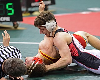 COLUMBUS, OHIO - MARCH 5, 2016: C.J. Frost of Canfield attempt to work the shoulders of Miles Mazik of Indian Valley to the mat during their 138lb Division II consolation bracket bout Saturday morning at Schottenstein Center. DAVID DERMER | THE VINDICATOR